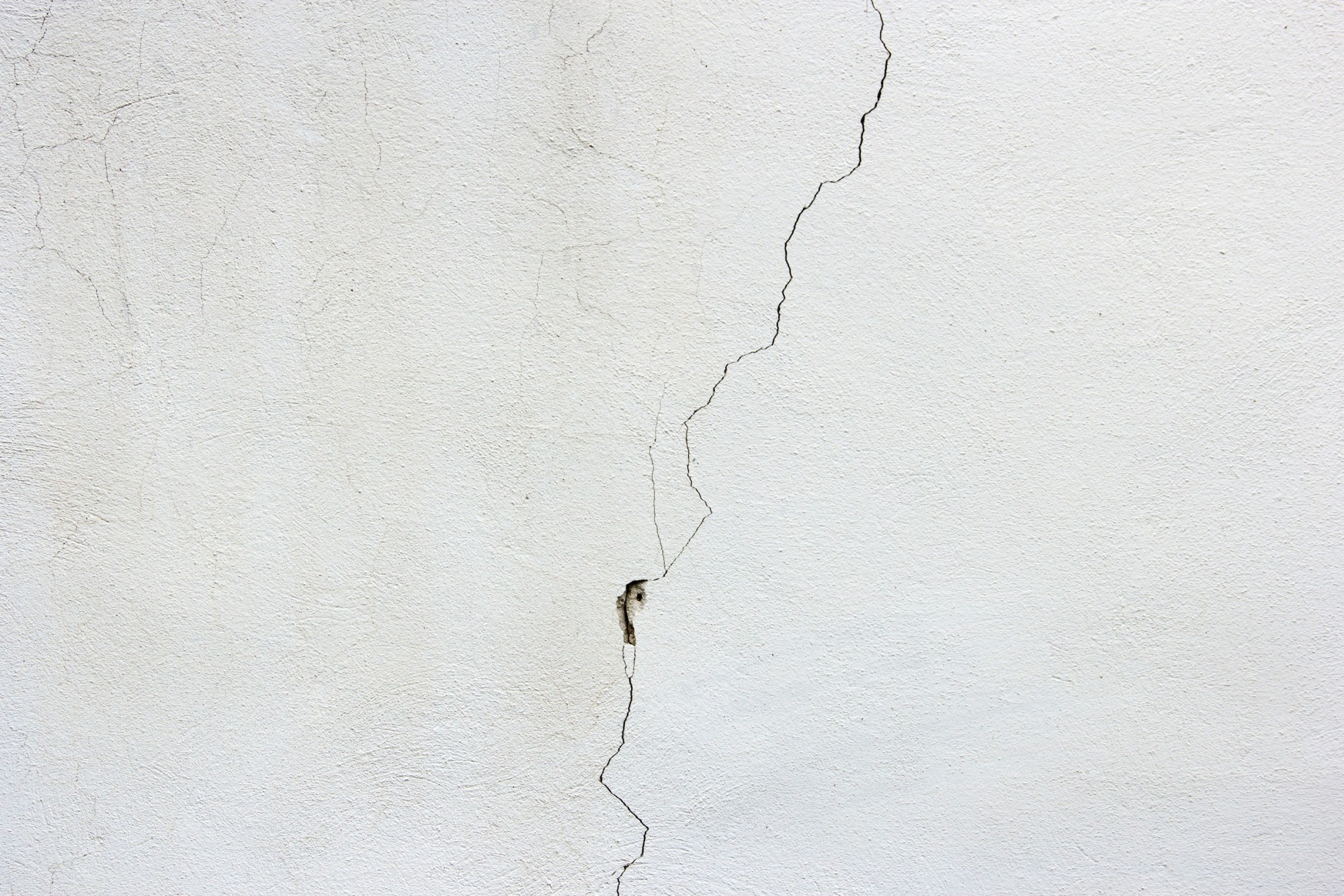 If you notice cracks in ceiling drywall, it's best to repair them as quickly as possible. Read about the common causes and solutions here.